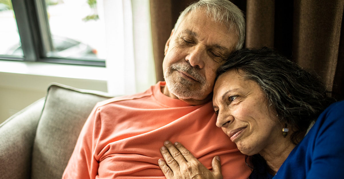 Couple sitting on couch